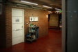 Industrial cleaning cart setup in a commercial hallway