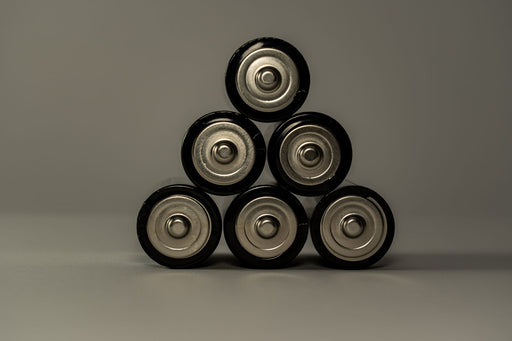 Batteries stacked in a pyramid shape