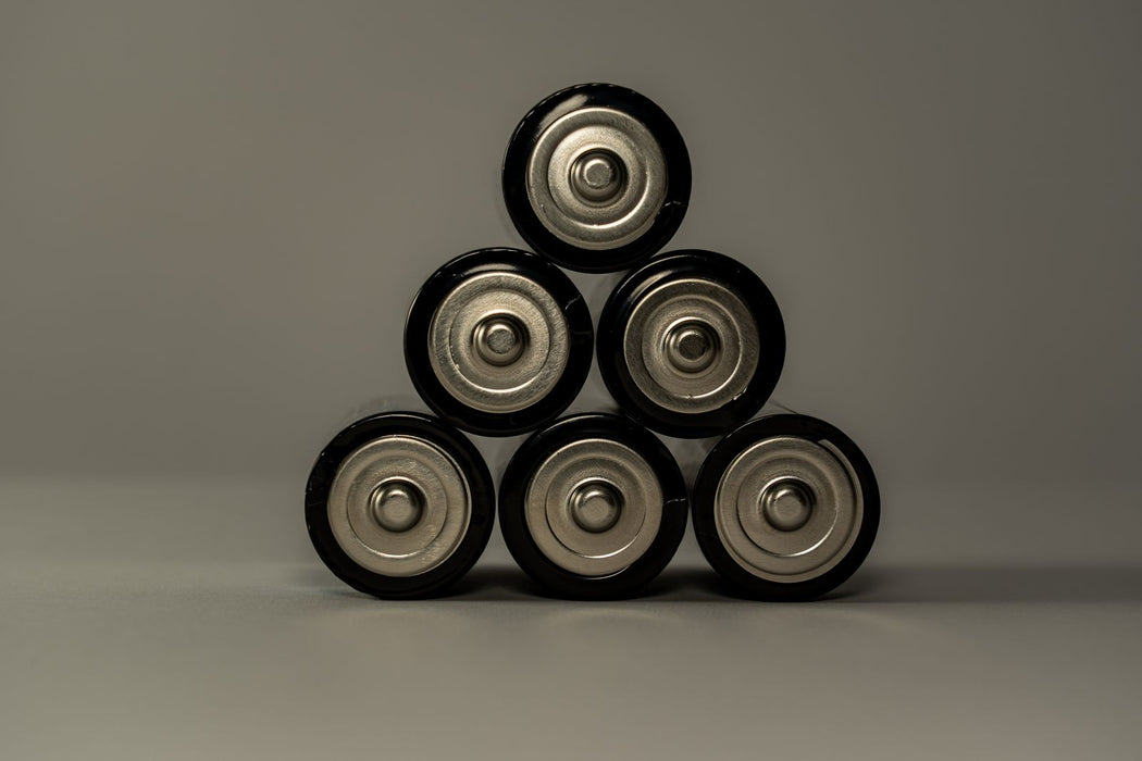 Batteries stacked in a pyramid shape