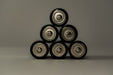 Batteries stacked in a pyramid shape