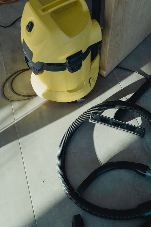 Industrial vacuum cleaner on tiled commercial floor