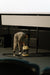 Worker using commercial cleaning equipment on a floor