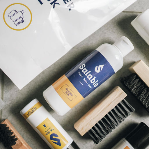 Close-up of cleaning products and brushes