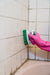 Replacement scrub brush cleaning a tiled surface